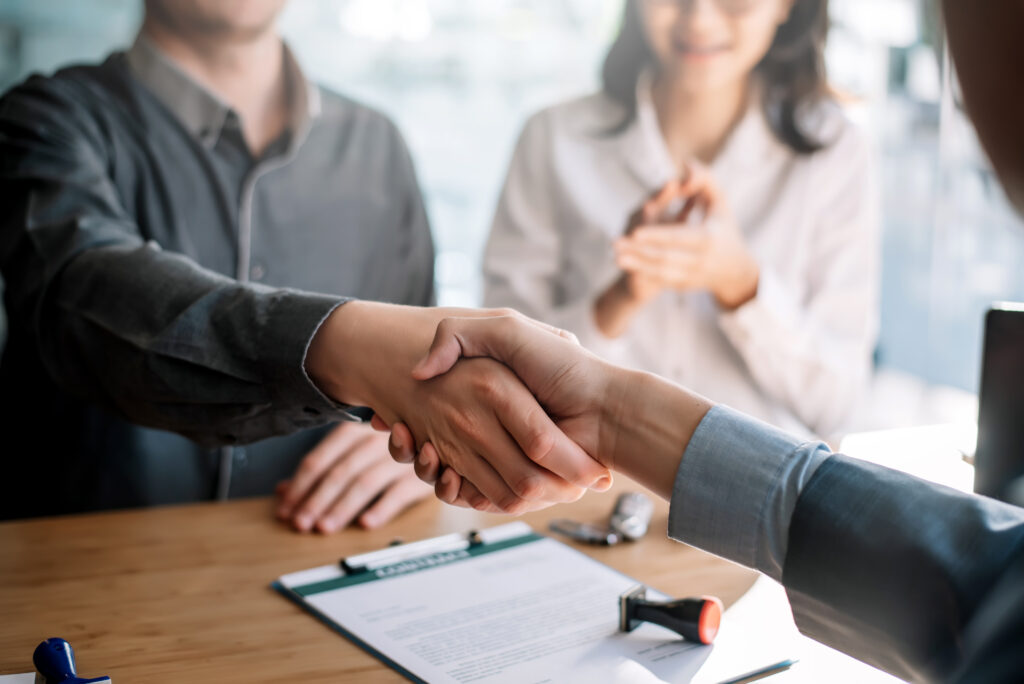 man shaking hand after business deal